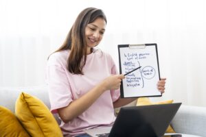 An online tutor conducting a virtual session with a studen